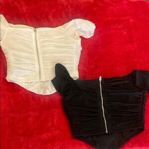 Elegant Women's White and Black Zippered Tops